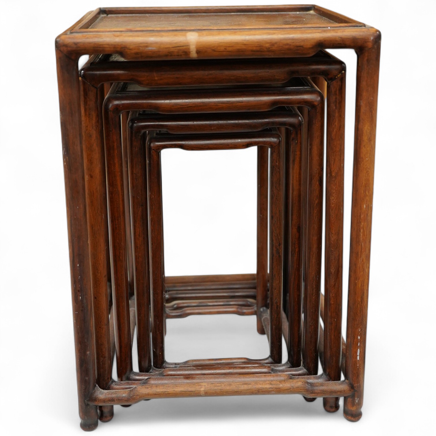 A nest of five Chinese hardwood stands, tallest (largest) 32cm high